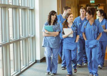 What uniform options are available to clinical staff?